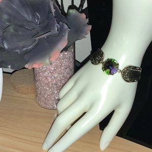 Large Swarovski Rainbow Peacock Eye Gem on Scroll Segmented Brass Bangle